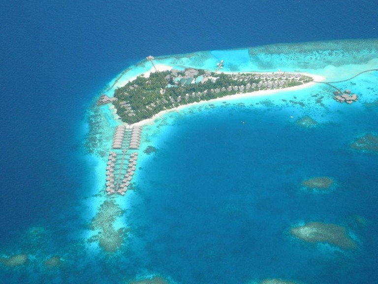 aerial view of island, sea and coral